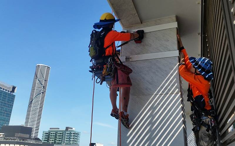 abseil concrete repair using harness