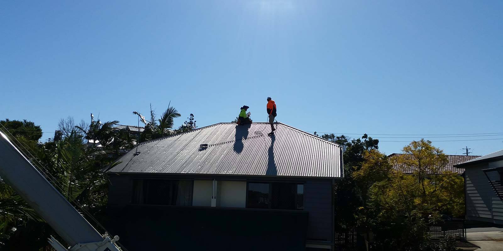 inspecting-the-top-of-a-roof