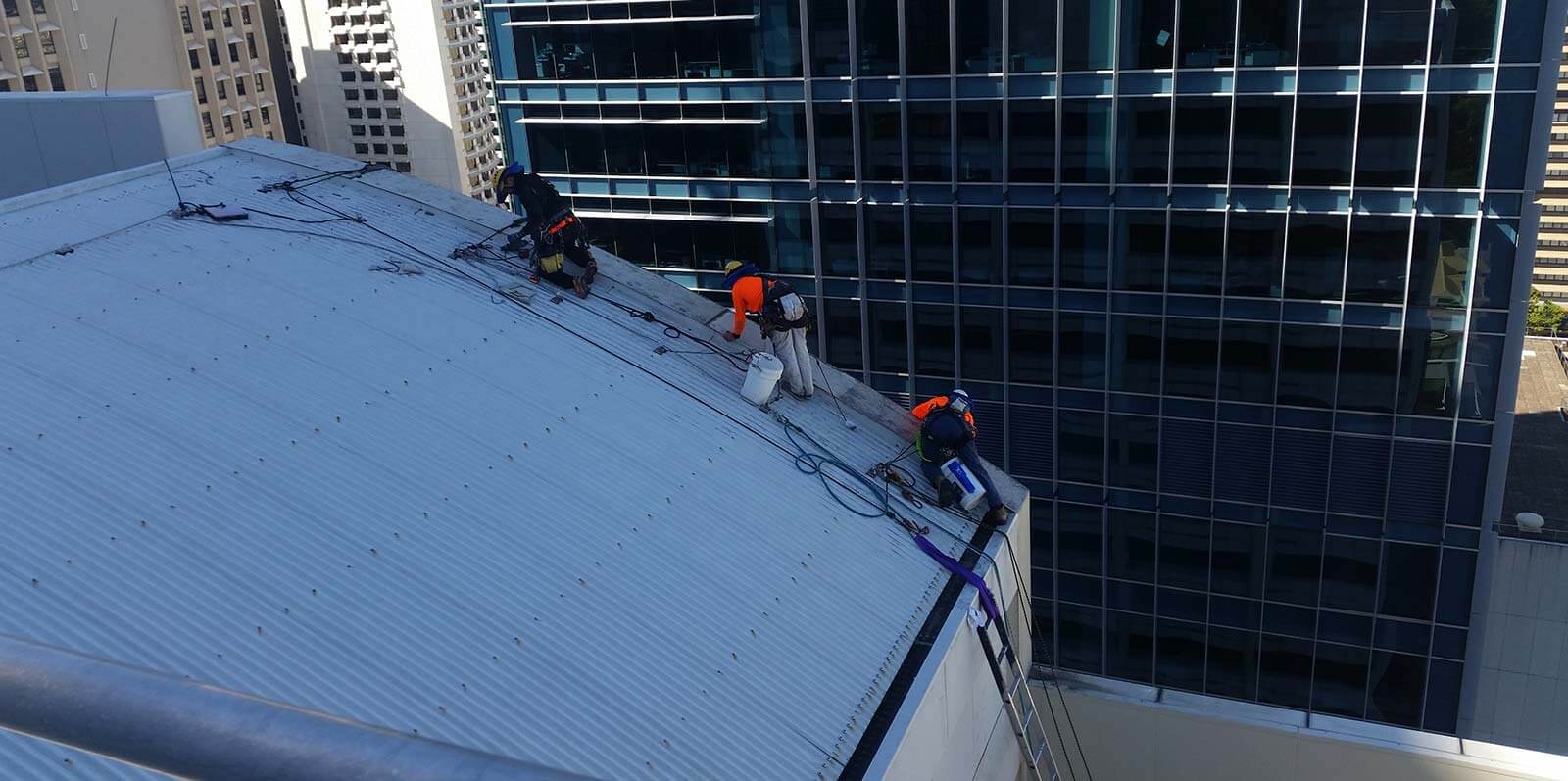 three-high-rise-professionals-working-up-high